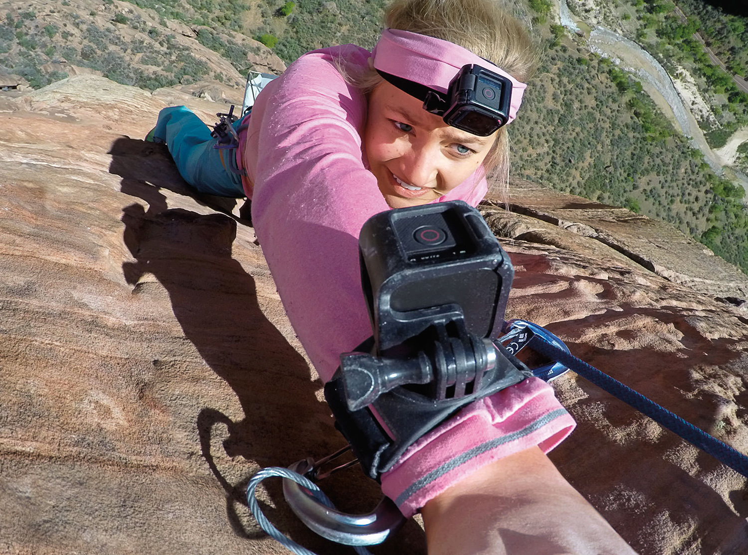 Go Pro Wrist strap hand wrist arm leg mount in use rockclimbing girl